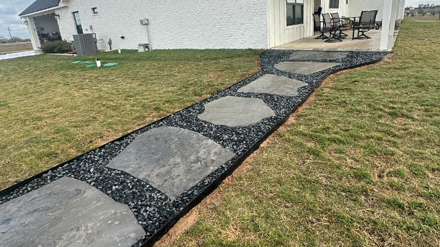 black gravel and dark stone walkway