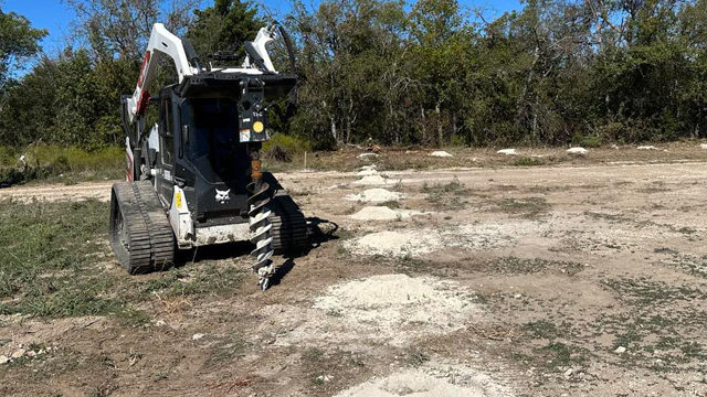 digging fence post holes