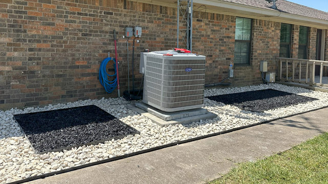 rock area around HVAC unit